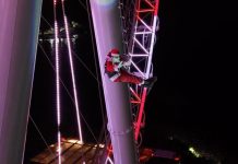 Papai Noel Radical encanta Balneário Camboriú em descida de rapel na Roda FG