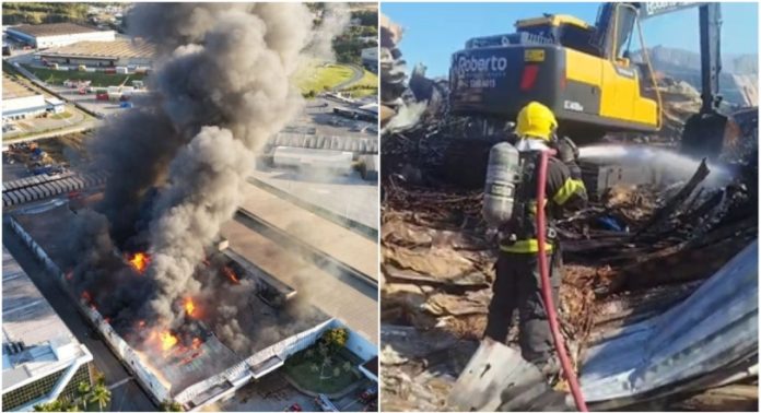 Após quase 20 horas de trabalho, bombeiros extinguem incêndio que destruiu fábrica da AMC Têxtil em Itajaí